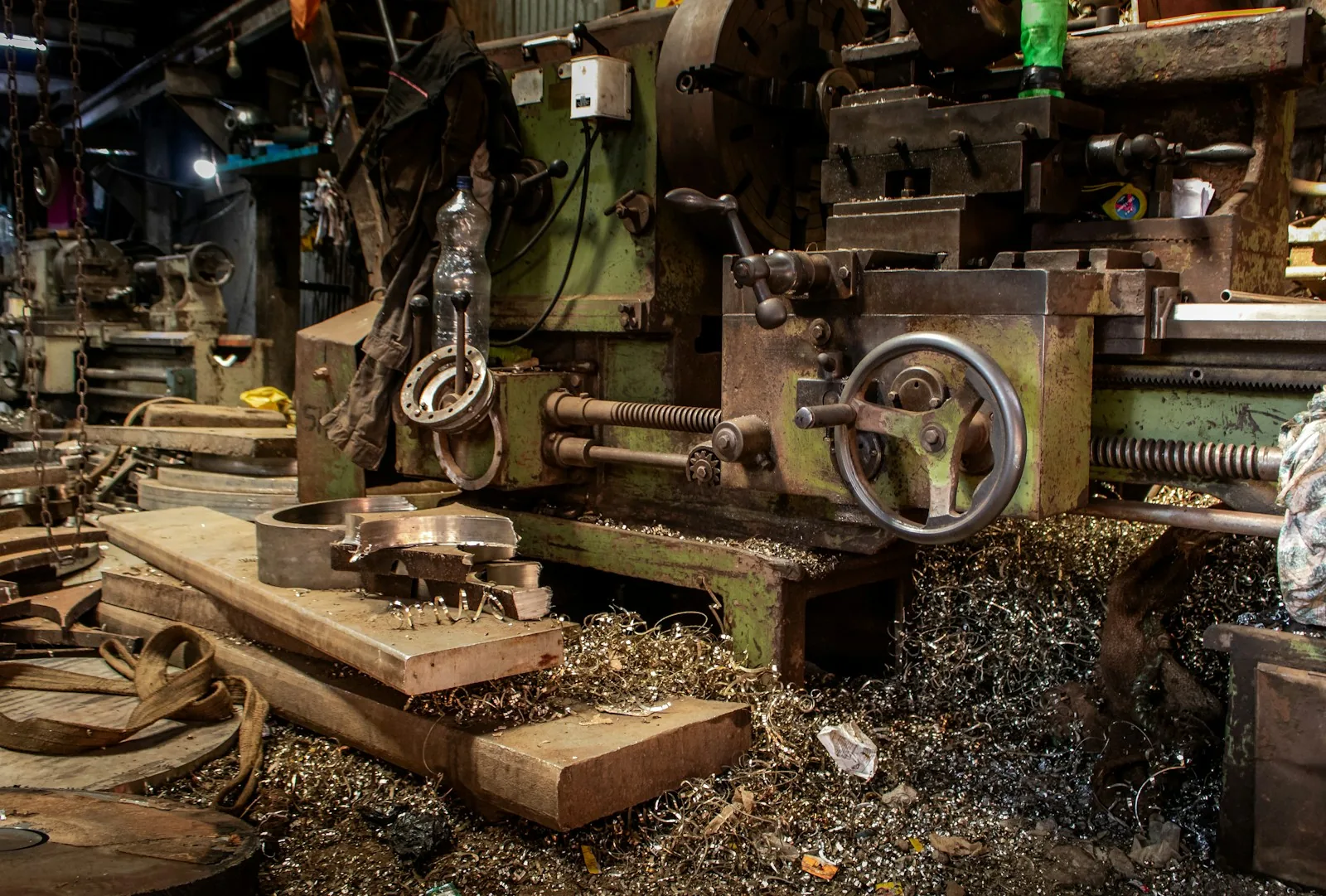 Industrial Swiss lathe with metal shavings from precision turning