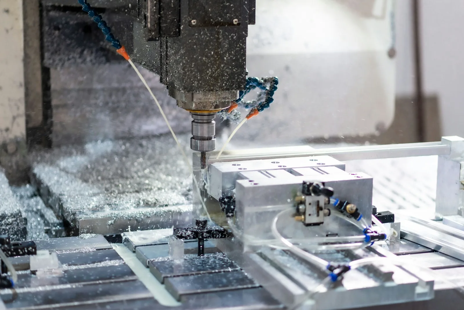 CNC machine cutting precision metal component