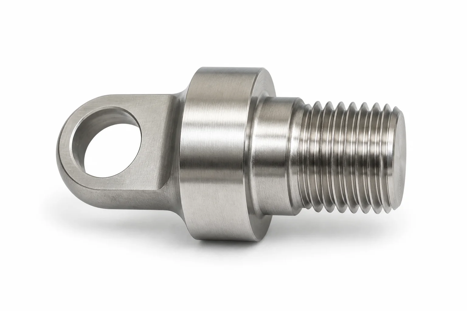 Precision-machined stainless steel flanged component with threading and eyelet